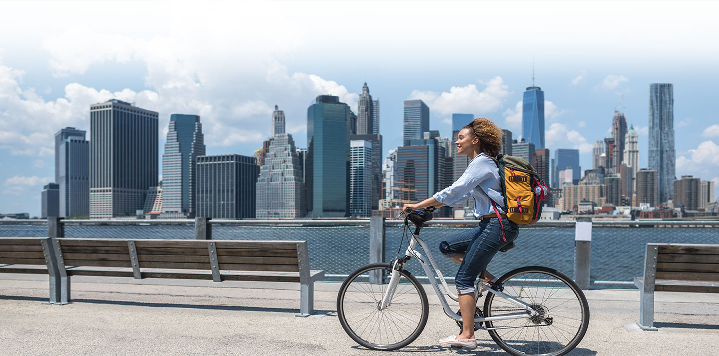 woman biking on domestic trip