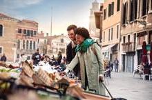 A couple browsing at a European village