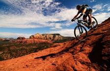 Person riding bike down hill